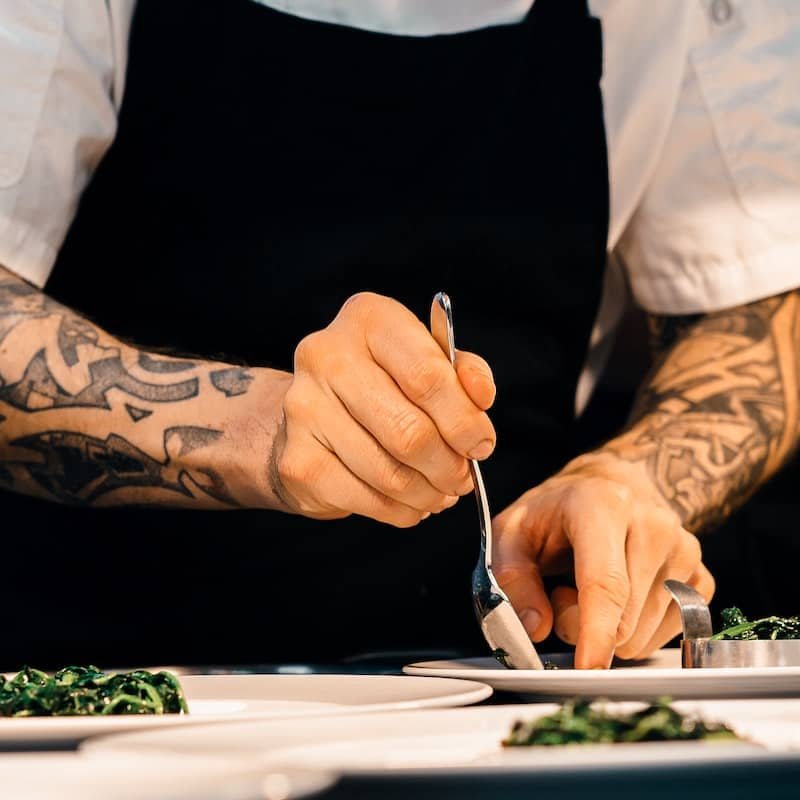 A chef cutting vegetables